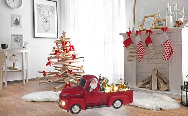 Lightahead Musical Santa Driving Pickup Truck Figurine with Christmas Scene, Turning Skaters, LED lights and 8 Melodies