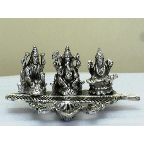 Lightahead Lord Ganesh,Goddess Lakshmi & Saraswati a unique diya tea light candle stand in white metal statue of Hindu Gods on a feather made in India
