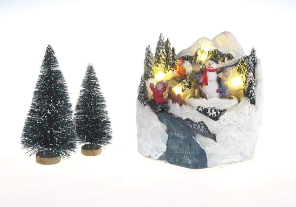 Lightahead Sliding Down A Musical Christmas Scene with Snowman and Children Figurine, LED lights and 8 Melodies